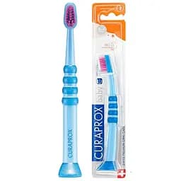 Зубна щітка дитяча Curaprox CS Baby з гумованою ручкою синя з рожевою щетиною