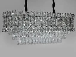 Хрустальная люстра над обеденным столом овальной формы на 8 ламп, хром.