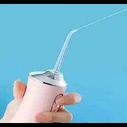 Іригатор акумуляторний Oral Irrigator S3J2 рожевий, з 3 насадками для чищення зубів - мініатюра 4
