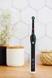 Подарунковий набір Oral-B Електрична зубна щітка Pro 1, чорний - мініатюра 7