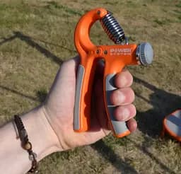 Еспандер кістьовий Power System PS-4021 з регульованим навантаженням 10-40 кг Power Hand Grip Orange (PS-4021_Orange) - мініатюра 6