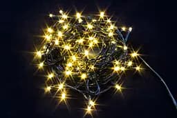 Гирлянда светодиодная нить на елку Тепло-белый 7м. 100 LED от сети черный провод