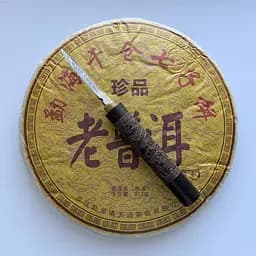 Шу пуер Lao Pu Er 2014 року млинець 357 г