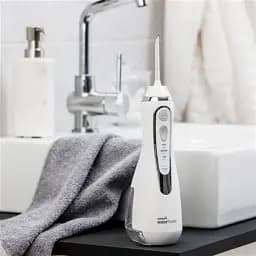 Іригатор Waterpik Cordless Advanced Water Flosser WP-560 White [67740] - мініатюра 9