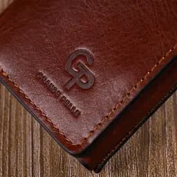 Стильний чоловічий гаманець у три складання Grande Pelle 16786 коричневий
