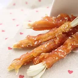 Ласощі для собак скибочки з куркою, тріскою та кунжутом Селянські Смаколики 500 г