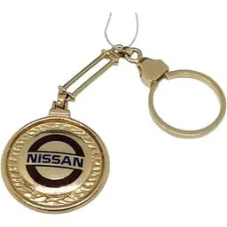 Золотий брелок NISSAN. 5221550