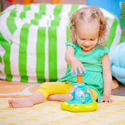 Дзиґа музична Chicco Bright Starts Press & Glow Spinner (10042) - мініатюра 2