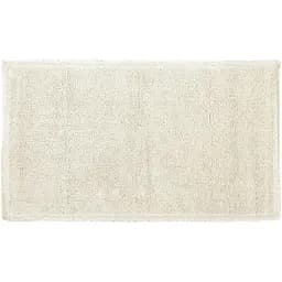 Килимок Irya Polka cream 90x50 см молочний (2000022187527)