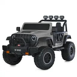 Електромобіль джип 24V7Ah 2x45W 2.4G пульт EVA MP3 Bluetooth шкіра сірий (M 6065EBLR-11)