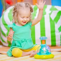 Дзиґа музична Bright Starts Press & Glow Spinner (10042) - мініатюра 5