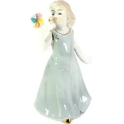 Девочка с игрушкой фарфор 12х7,5х5,5 см (29656B)