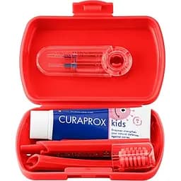 Дорожній набір Curaprox Kids червоний: зубна щітка Kids + дитяча зубна паста 10 мл + йоршики 2 шт.