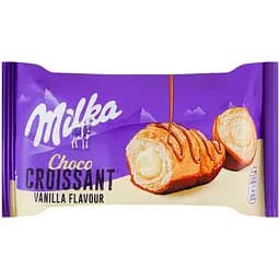 Круасан Milka с начинкой со вкусом ванили, снизу глазированный молочным шоколадом и сверху декорированный молочным шоколадом, 50г