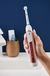 Електрична зубна щітка Oral-B Special Edition Genius X Rose Gold, рожевий - мініатюра 7