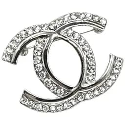 Стильна брошка у трендовому дизайні зі стразами для особливого образу декоративна жіноча прикраса на одяг Сріблястий