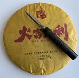 Шу Пуер Da Ji Da Li Побажання благополуччя млинець 357 г 2019 року