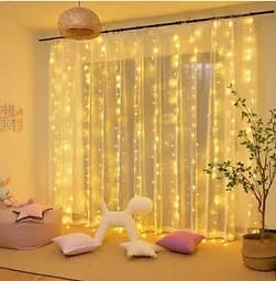 Гірлянда штора Водоспад 3х2 м 400 LED (прозорий шнур з перехідником) Золоте світло