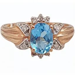 Золотое кольцо с бриллиантами и топазом. RT1101K 19