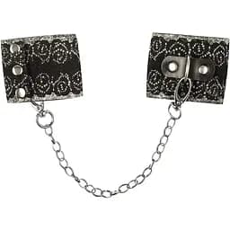 Широкие наручники с блестками и цепью Obsessive