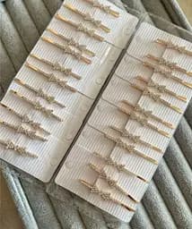 Набір заколки-невидимки з стразами у формі бантика 24 шт Золотистий