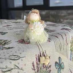 Великодня декоративна лялька бежева з квіткою MIS LT