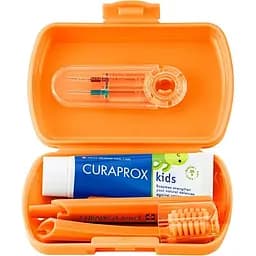 Дорожній набір Curaprox Kids помаранчевий: зубна щітка Kids + дитяча зубна паста 10 мл + йоршики 2 шт.