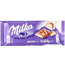 Шоколад молочний Milka, наповнений білим пористим шоколадом 95 г