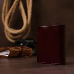 Жіноче глянсове шкіряне портмоне Shvigel 16484 бордове - мініатюра 7