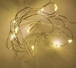 Гірлянда яскрава на двох батарейках AA довжина 120 см 10 LED лампочок із теплим білим світлом 0,6 Вт новорічна - мініатюра 5