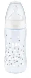 Бутылочка для кормления NUK First Choice Plus Конфетти , c силиконовой соской, р.1, 300 мл (3952365)