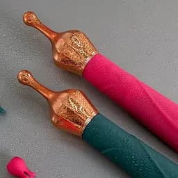 Двосторонній член для стимуляції клітора з вакуумом рожевий, зелений