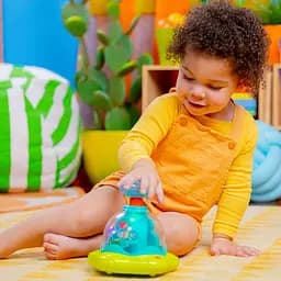 Дзиґа музична Bright Starts Press & Glow Spinner (10042) - мініатюра 8