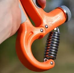 Еспандер кістьовий Power System PS-4021 з регульованим навантаженням 10-40 кг Power Hand Grip Orange (PS-4021_Orange) - мініатюра 4