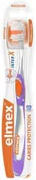 Зубна щітка Elmex Захист від карієсу, середня, фіолетовий
