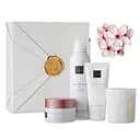 Подарочный набор Rituals The Ritual Of Sakura: гель-пена для душа Foaming Shower Gel 200 мл + ароматическая свеча Scented Candle 140 г + скраб для тела Body Scrub 125 г + крем для тела Magic Touch Body Cream 100 мл