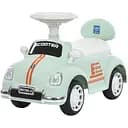 Каталка-толокар Bambi с музыкальными и световыми эффектами, стойкий с багажником, зеленого цвета.