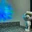 Лазерний нічник-проектор зоряного неба з bluetooth динаміком Astronaut projector light XL-818 білий - мініатюра 5